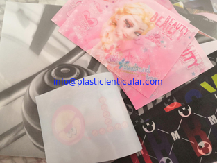 China soft lenticular badge printing 3d lenticular fabrics flip sticker with hot melt adhesive for ironing on tshirts supplier